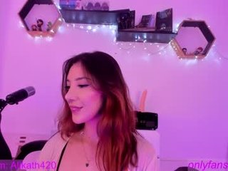 thecosmicgirl 18 y. o. redhead tattooed cam girl doing the sexiest things in her live sex chat room
